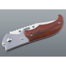 Fémből készült , fahatású markolatú rugós bicska