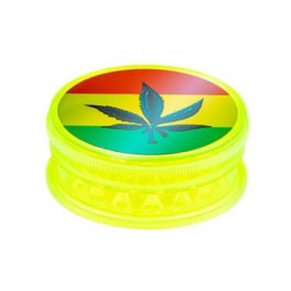 Super Heroes Grinder 2 részes műanyag dohányőrlő – neonsárga színben, kenderlevél mintával, Ø 6 cm
